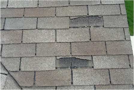 Wind damaged roof